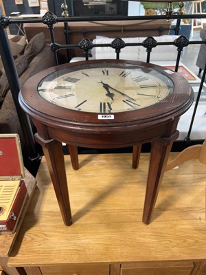 Lot 1051 - Clock face encased in mahogany finish table