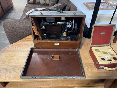 Lot 1052 - Manual powered hand operated Singer sewing...