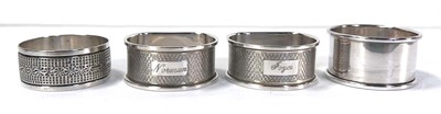 Lot 344 - A pair of silver engine turned napkin rings,...
