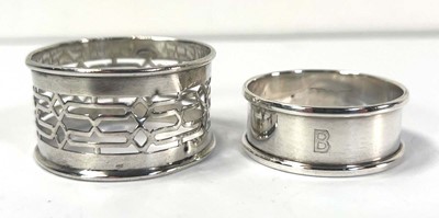 Lot 350 - An Edwardian pierced silver napkin ring,...