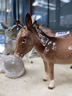 Lot 5014 - Seven Beswick, Lladro and unbranded donkey...