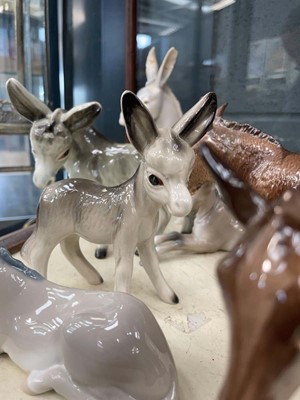 Lot 5014 - Seven Beswick, Lladro and unbranded donkey...