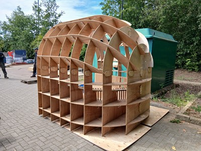 Lot 4473 - Sectional plywood hut frame with seating