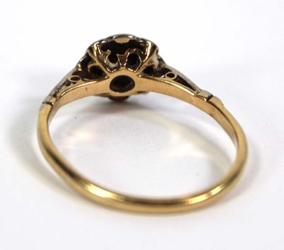 Lot 756 - An 18ct yellow gold ring set small sapphire...