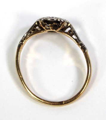 Lot 756 - An 18ct yellow gold ring set small sapphire...
