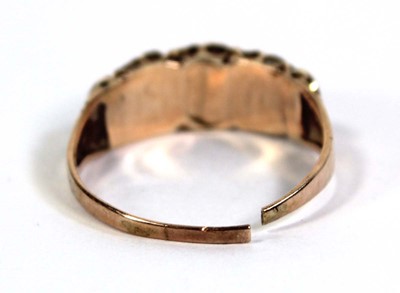 Lot 757 - A 9ct yellow gold ring set five graduated...