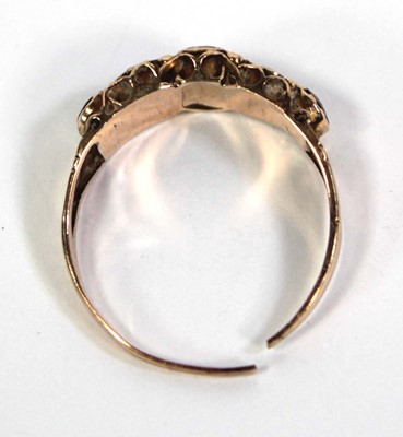 Lot 757 - A 9ct yellow gold ring set five graduated...