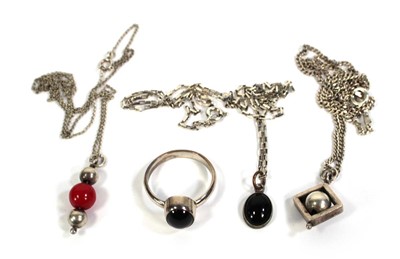 Lot 760 - Four items of silver and metalware jewellery...