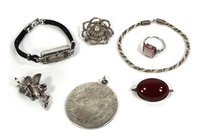 Lot 762 - Seven items of silver and metalware jewellery...