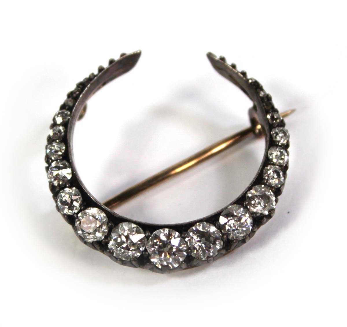 Lot 764 - An early 20th century yellow and white metal...