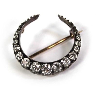 Lot 764 - An early 20th century yellow and white metal...