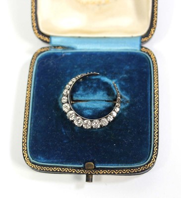 Lot 764 - An early 20th century yellow and white metal...