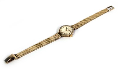 Lot 477 - A ladies 9ct yellow gold wristwatch by Omega,...