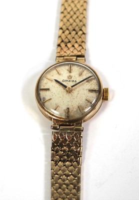 Lot 477 - A ladies 9ct yellow gold wristwatch by Omega,...