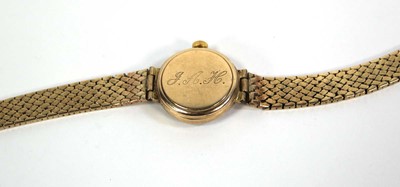 Lot 477 - A ladies 9ct yellow gold wristwatch by Omega,...