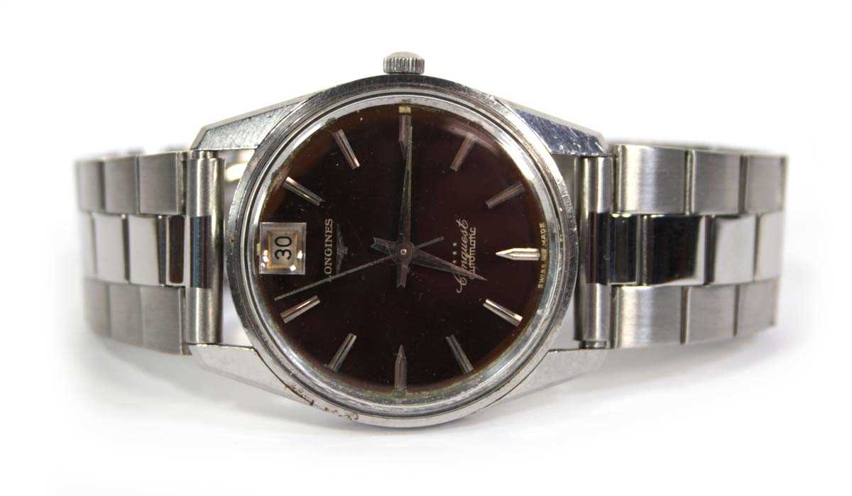 Lot 479 - A stainless steel automatic Conquest...