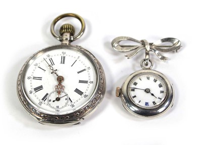 Lot 465 - A silver open face nurses type fob watch, the...