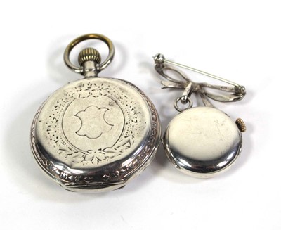 Lot 465 - A silver open face nurses type fob watch, the...