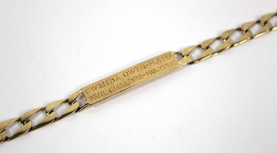 Lot 770 - A 9ct yellow gold flat curblink identity...