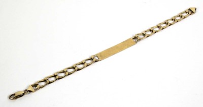 Lot 770 - A 9ct yellow gold flat curblink identity...