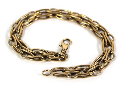 Lot 772 - A 9ct yellow gold fancy link bracelet with...