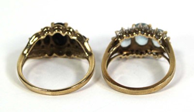 Lot 776 - Two 9ct yellow gold rings, each set blue...