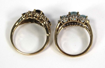 Lot 776 - Two 9ct yellow gold rings, each set blue...