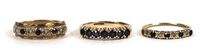 Lot 778 - Three 9ct yellow gold half eternity rings,...