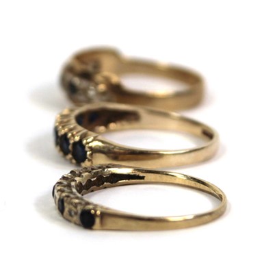 Lot 778 - Three 9ct yellow gold half eternity rings,...