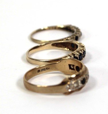 Lot 778 - Three 9ct yellow gold half eternity rings,...