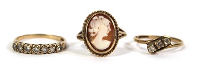 Lot 779 - Two 9ct yellow gold rings set paste and a...