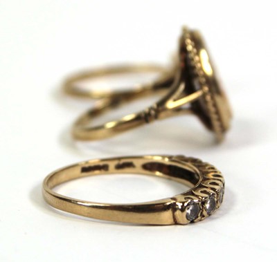 Lot 779 - Two 9ct yellow gold rings set paste and a...