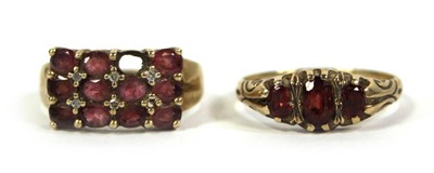 Lot 780 - Two 9ct yellow gold rings set pink and red...