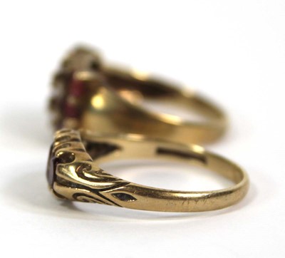 Lot 780 - Two 9ct yellow gold rings set pink and red...
