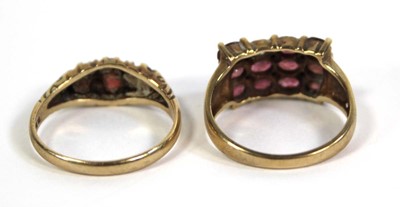 Lot 780 - Two 9ct yellow gold rings set pink and red...