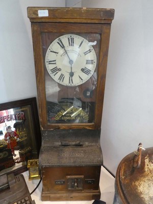 Lot Dark oak cased clocking in machine by National...