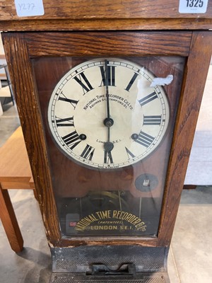 Lot Dark oak cased clocking in machine by National...