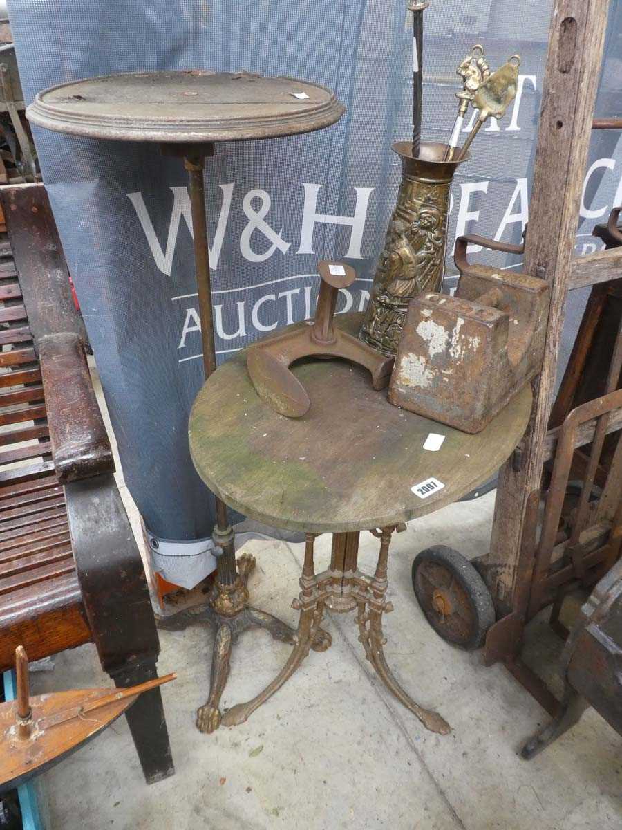 Lot Wooden oval top table on decorative wrought...