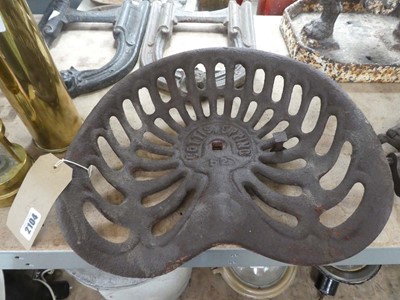 Lot Cast iron tractor seat (no. 62) by Cottis. Epping