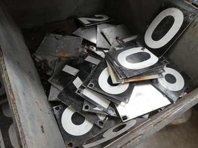 Lot Shelf containing vintage number plates with...