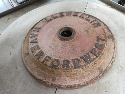 Lot Circular industrial lid inscribed, 'Llewellin...
