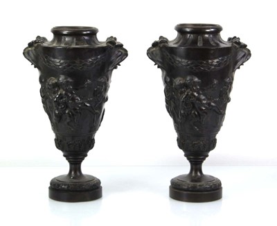 Lot 51 - A pair of brown-patinated bronze vases of urn...