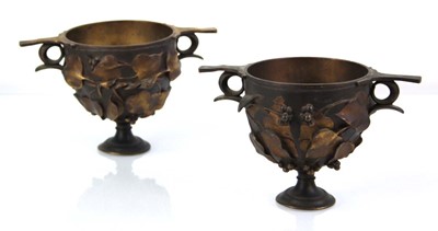 Lot 53 - A pair of gilt metal garnitures or open footed...