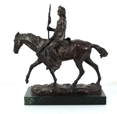 Lot 57 - A bronze sculpture modelled as a Native...