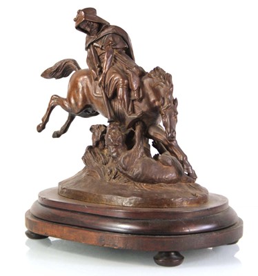 Lot 66 - A brown-patinated spelter figural group...