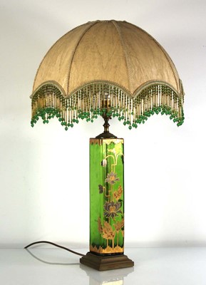 Lot 79 - A 20th century table lamp, the green glass...