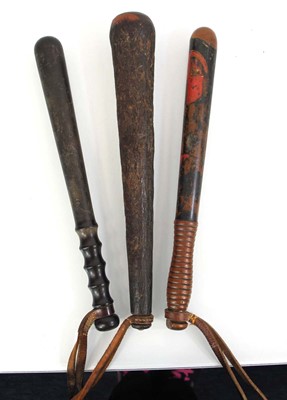 Lot 80 - A 19th century polychrome turned police...