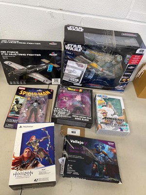 Lot 1812 - Collection of models and figures to include an...