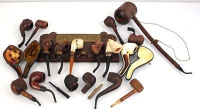 Lot 83 - A group of pipes including a cased meerschaum...