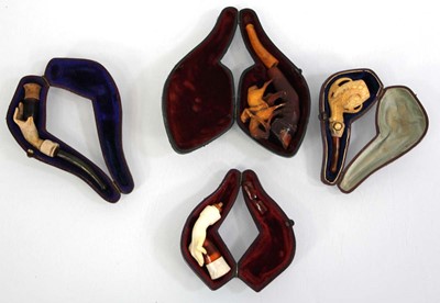 Lot 85 - A group of cased pipes including three...